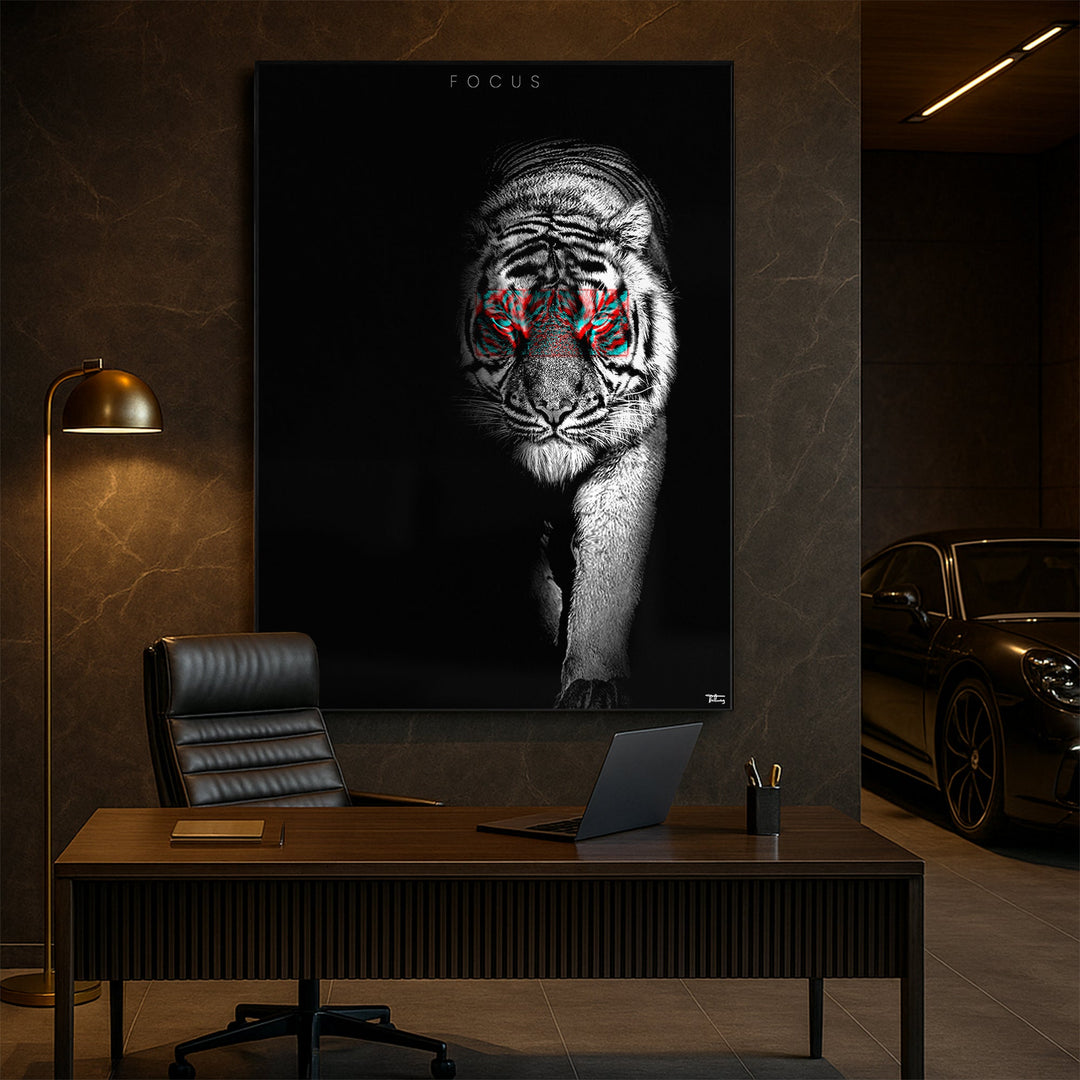 “Large fine art print of a black-and-white tiger with red-accented eyes titled ‘FOCUS’, mounted on a dark office wall behind a modern executive desk, with a luxury car in the background.