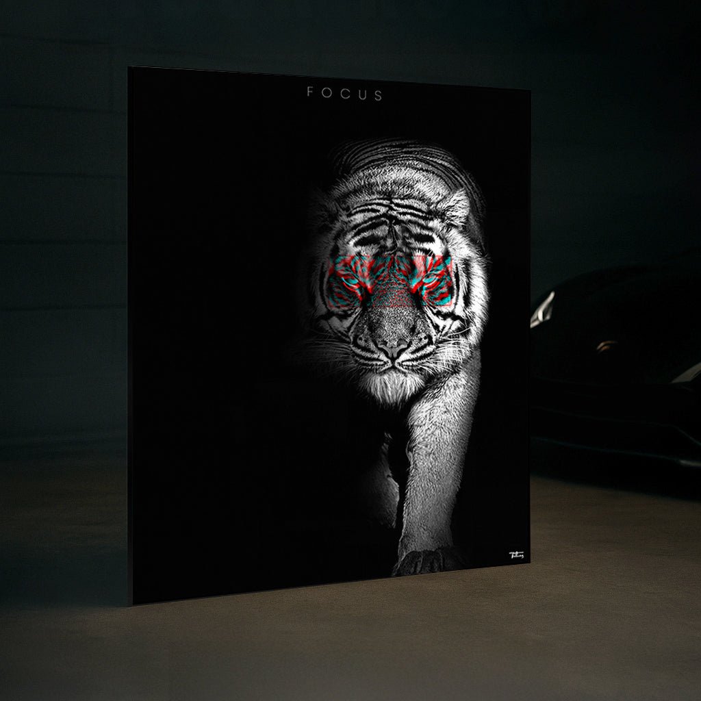 FOCUS’ tiger fine art print displayed next to a luxury car in a dark interior, emphasizing bold design and high-end taste.